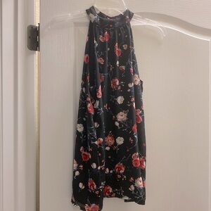 Black floral sleeveless classy blouse size xs fits like a small, brand is Gibson